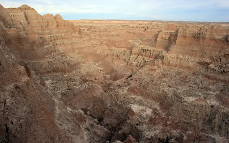 Badlands formations are very rugged and often have sharp peaks.