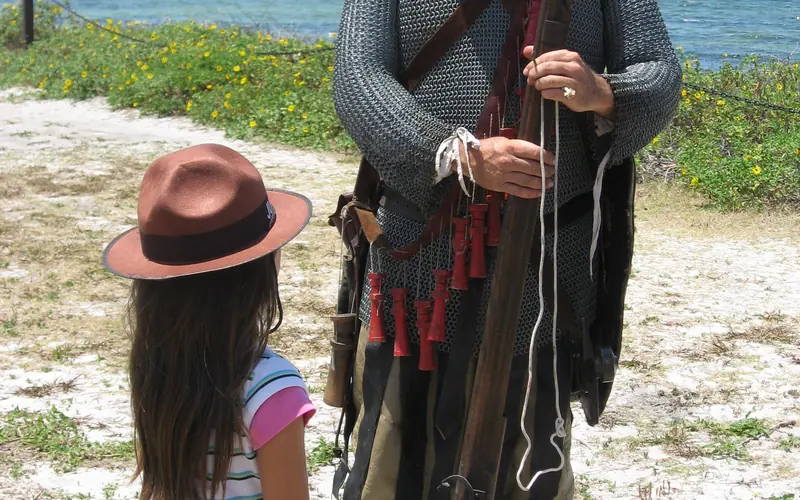 De Soto Tim Burke greets on of the parks Junior Rangers