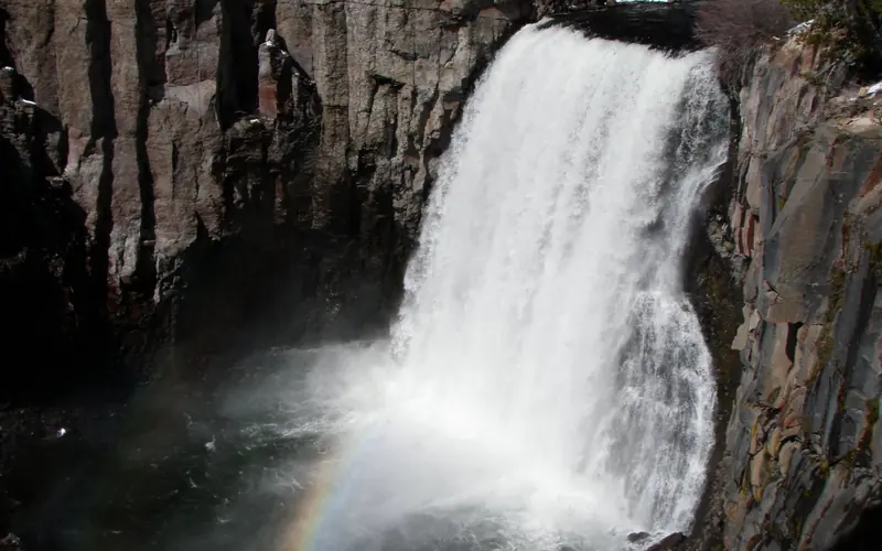 Waterfall with faint rainbow