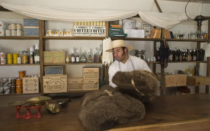 Living history interpreter portraying the Post Trader.