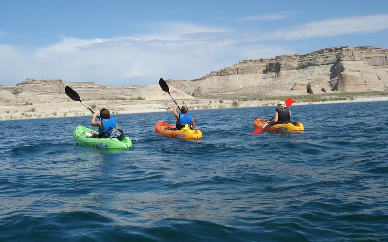 Three kayaks on the lake.
