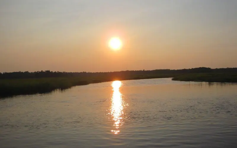 Sun setting over the river.