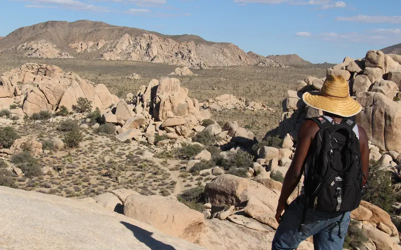 hiker looks over Hidden Valley