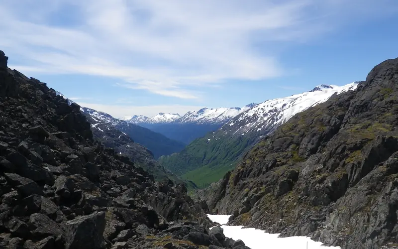 View from a mountain pass down a valley