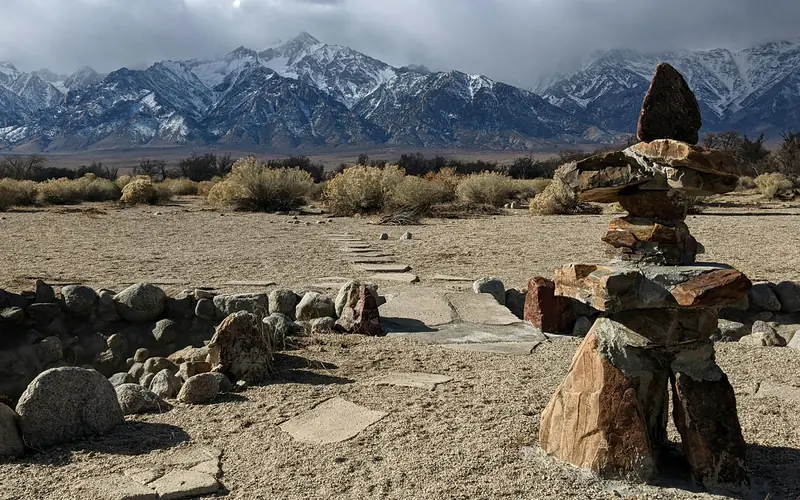 Japanese stone lantern with mountains in background