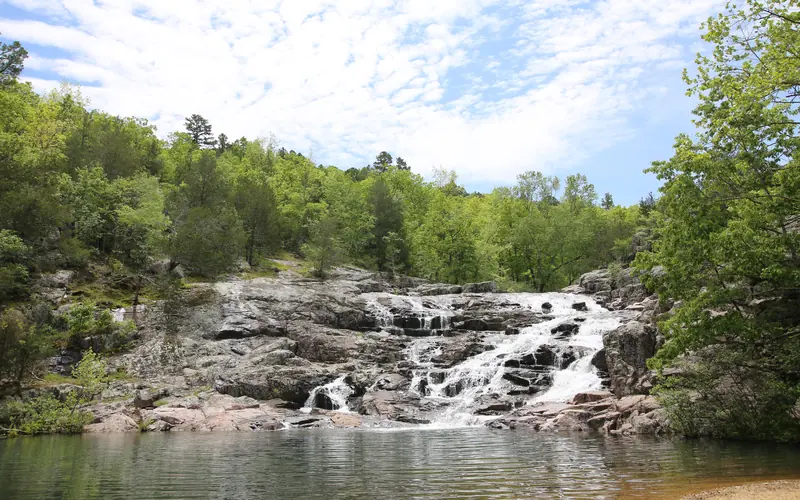 A rocky "shut-in" with a modest waterfall.