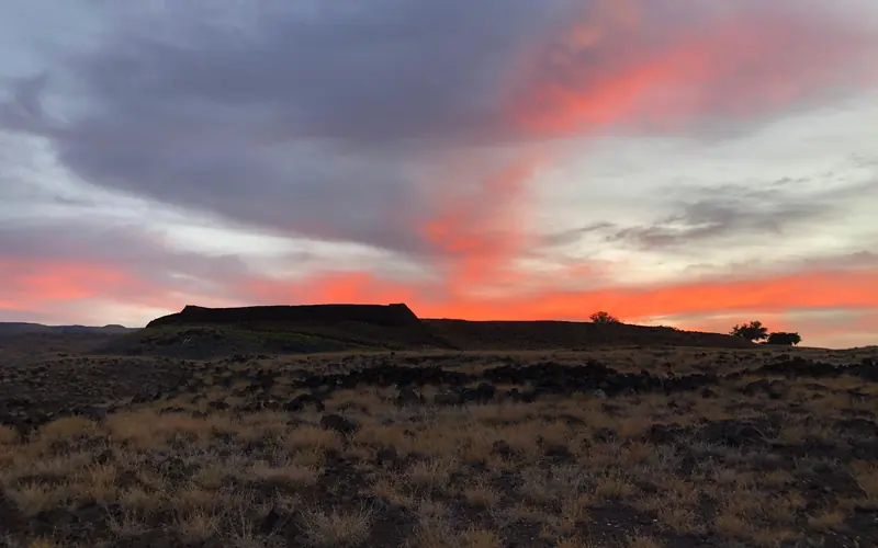 Sunrise over Pu'ukoholā Heiau in mid September.