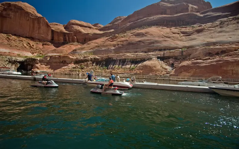 Boats and personal watercraft sidle up to docks.