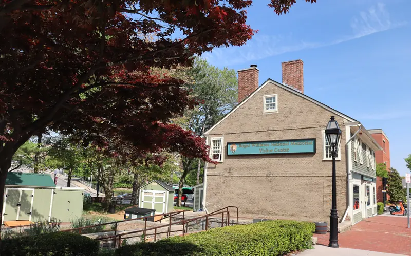 Historic building with lamppost and sidewalk