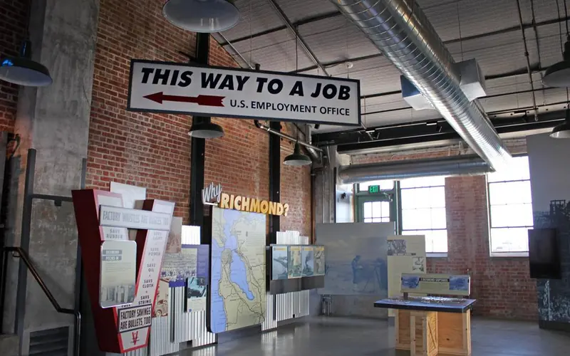 Multiple exhibit signage and panels in the visitor education center.