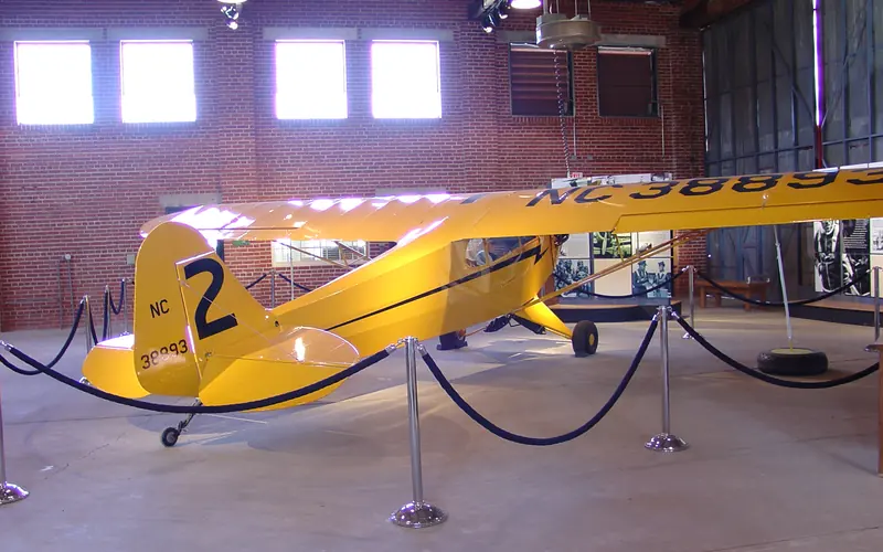 Small Yellow training plane used in the Civilian Pilot Training Prograj - J3 Piper Cub